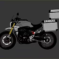 Adventure Motorcycle With Black Frame Silver Storage Cases And Red Spoked Wheels Design