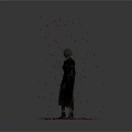 A woman in black standing with red petals falling around on gray background under spotlight