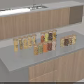 Clear Glass Spice Jars With Wooden Lids For Various Spices On Kitchen Countertop