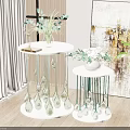Elegant Modern Round Coffee Table With White Marble Top Glass Droplet Decor And Green Plants