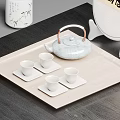 Light Blue Teapot With Four Teacups On Wooden Tray Square Coasters Tea Set