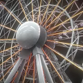 Ferris Wheel Amusement Equipment With White Hub Metal Frame LED Lights And Passenger Cabins