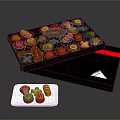 Assorted Chocolate Pieces In Opened Gift Box With White Plate And Various Shapes