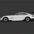 Sleek Silver And Black Sports Car With Large Rear Spoiler And Aggressive Front Design