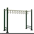 Outdoor Sports Equipment With Green Vertical Poles And Hanging Rings For Fitness