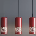 Red Cylindrical Pendant Lights With Perforated Patterns Hanging Against Gray Background Wall 3d model