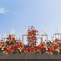 Floral Art Installation With Vibrant Red Orange Flowers Outdoor Decorative Letters And Blue Sky Background