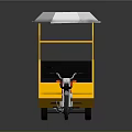 Yellow Three Wheeled Motorcycle With White Canopy Red Lettering And Black Seats