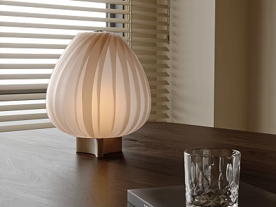 Decorative Ornament Set With White Striped Table Lamp And Transparent Glass Cup On Wooden Tabletop 3d model