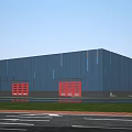 Modern Industrial Factory Building With Metal Siding Red Doors And Green Lawn