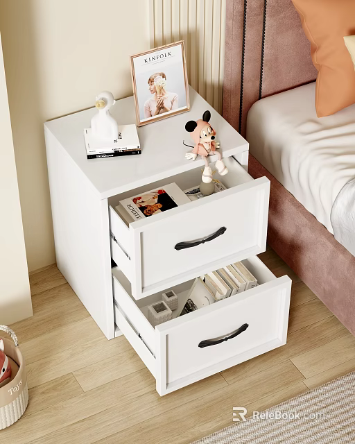 White Bedroom Cabinet with Drawers Containing Books Magazines and Top Decorations like Doll Photo Frame 3d model 