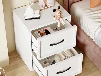White Bedroom Cabinet with Drawers Containing Books Magazines and Top Decorations like Doll Photo Frame 3d model