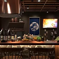 Traditional Japanese Restaurant Interior Featuring Wooden Bar Counter Cozy Seating And Warm Lighting