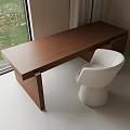 Wooden Desk Interior With Window View of Grass and Fallen Leaves and White Chair