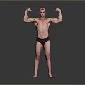 Shirtless Man Flexing Muscles In Black Underwear Against Gray Background