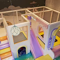 Indoor Kids Playground With Colorful Slide Stairs And Hanging Decoration Balls