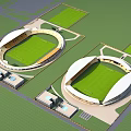 Two Large Stadiums With White Roofs Green Turf And Surrounding Facilities