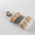 Fresh Homemade Bread in Different Shapes and Sizes with Striped Patterns on White Background