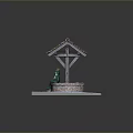 Miniature Well Model With Colorful Tile Roof And Green Frog Statue On Snowy Grass Base
