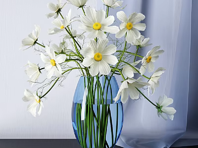 Blue Vase With White Flowers Having Yellow Centers And Green Stems In Water 3d model