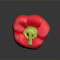 Fresh Ripe Red Bell Pepper with Green Stem on Dark Surface
