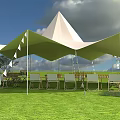 Garden Landscape Featuring White Tensile Membrane Green Lawn Outdoor Seating And Flag Decorations