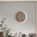 Modern Living Room Interior Design With Sofa Cushions Circular Wall Decor And Green Plant