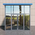 Modern Glass Double Doors With Gray Frame and Blue Canopy Against Light Wall