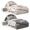 Modern Bedroom Setup With Upholstered Bed Frame And Decorative Pillows
