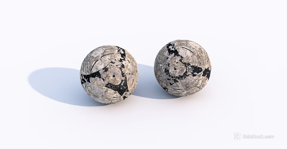 Two Black And White Patterned Spherical Sports Equipment Balls With Textured Surface Design 3d model 