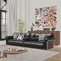 Black Leather Sectional Sofa with Black White Pillows Modern Living Room Abstract Painting Green Plant