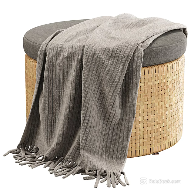 Round Woven Stool With Gray Padded Seat And Draped Blanket 3d model 