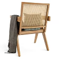Wooden Frame Leisure Chair With Rattan Backrest Green Striped Cushion And Dark Blanket