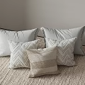 Minimalist Light Gray Beige Pillows With Textured Patterns On Soft Carpet Floor 3d model