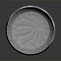 Intricate Carved Silver Bowl Sculpture With Detailed Patterns And Reflective Surface