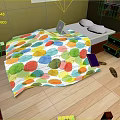 Cozy Bedroom With Yellow Walls Colorful Polka Dot Quilt Nightstand Red Cup And Wooden Floor