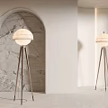 Modern Floor Lamp with Tripod Base and White Lampshade in Minimalist Interior Near Arched Doorway