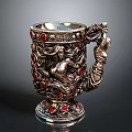 Decorative Silver Cup With Carved Female Figure And Red Gemstones Accents