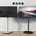 Two Modern Mobile TVs with Silver and Black Bases Showing Scenic Views