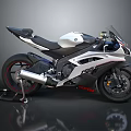 Sleek Silver And Black Sport Motorcycle With Aerodynamic Body And Stylish Design