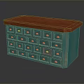 Blue Cabinet With Red Top And Multiple Drawers Featuring Gold Knobs