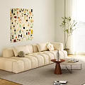 Modern Beige Sofa and Round Coffee Table Set With Decorative Pillows and Abstract Wall Art