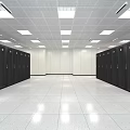 Industrial Server Room Featuring Rows Of Black Server Cabinets White Ceiling Lights And Spacious Aisle