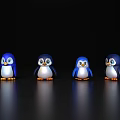 Four Cute Blue Penguin Figurines Arranged On Black Reflective Surface