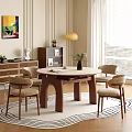 Elegant Round Dining Table Set With Beige Top Brown Legs Four Chairs And Decorative Vase