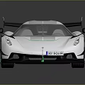 White Sports Car With Green Accent Stripes Large Rear Spoiler And High Performance Aerodynamic Design