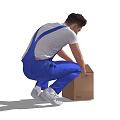 Man in Blue Overalls and White T-Shirt Kneeling to Handle Brown Cardboard Box