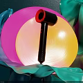 Stylish Black And Red Hair Dryer With Colorful Circular Backdrops And Green Wavy Fabric
