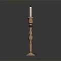 Elegant Brass Candle Holder Stand With Lit White Candle And Detailed Design