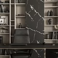 Modern Office Desk And Chair Setup Against Marble Wall With Wooden Bookshelves And Decorative Items